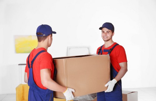 Packed household items ready for man with van removal in St Lukes