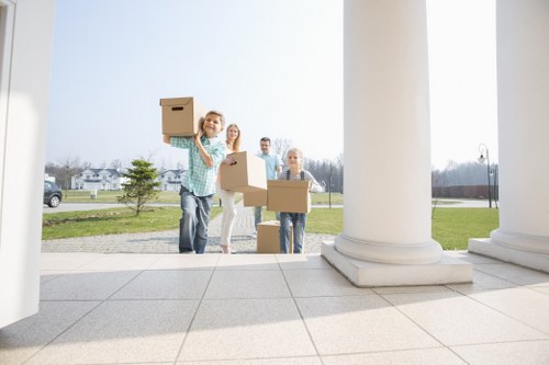 Furniture being moved from an apartment or townhouse in St Lukes