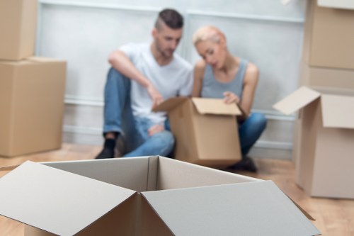 Prepared moving boxes and furniture ready for truck hire
