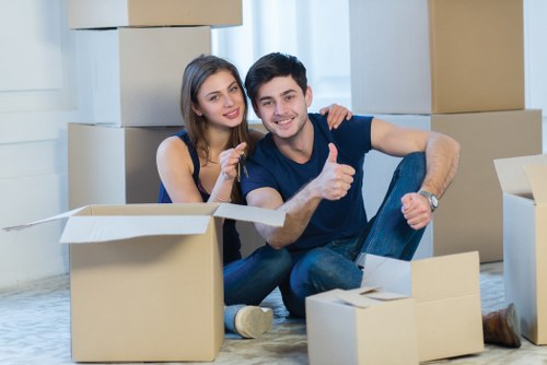 Local commercial movers handling furniture and supplies in a St Lukes property