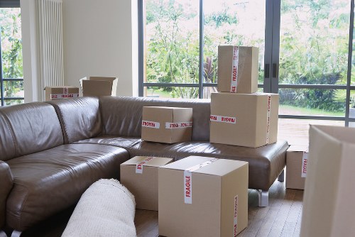 Loading boxes and furniture into a removals van in St Lukes